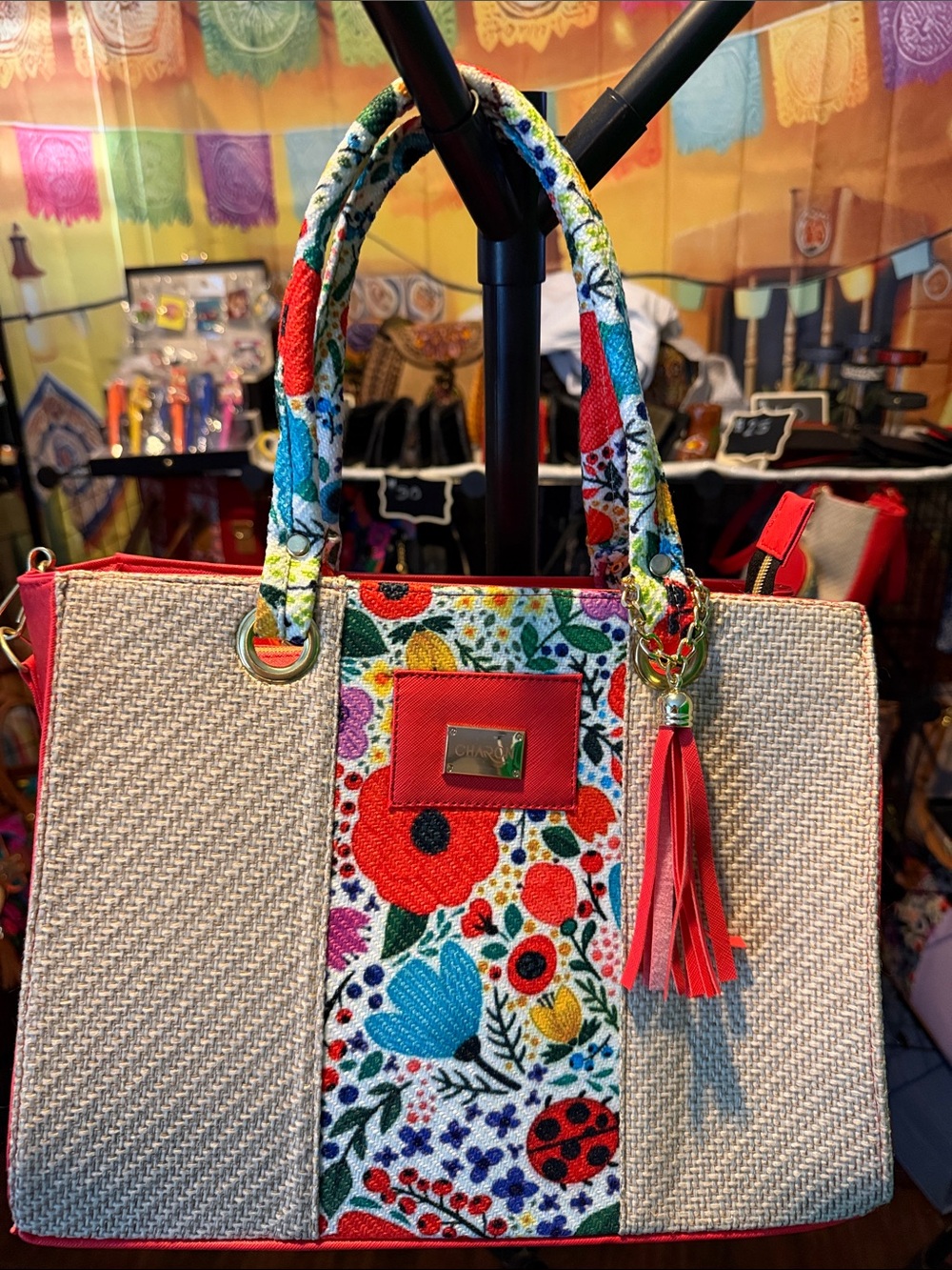 Colorful Floral Straw Tote with Red Trim and Tassel